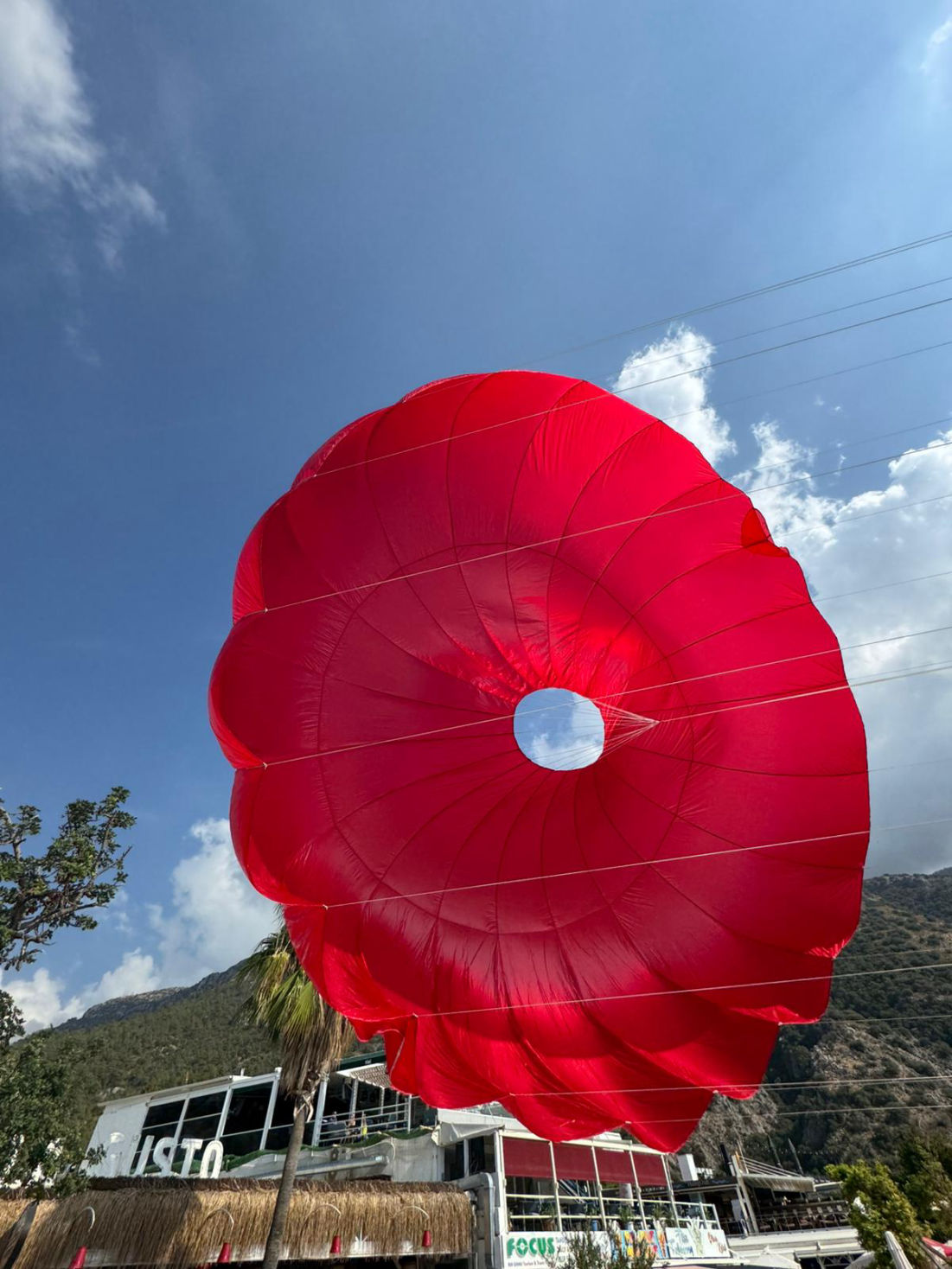 Red around shaped parachute.